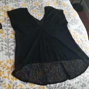 Sheer blouse with lace panel on back